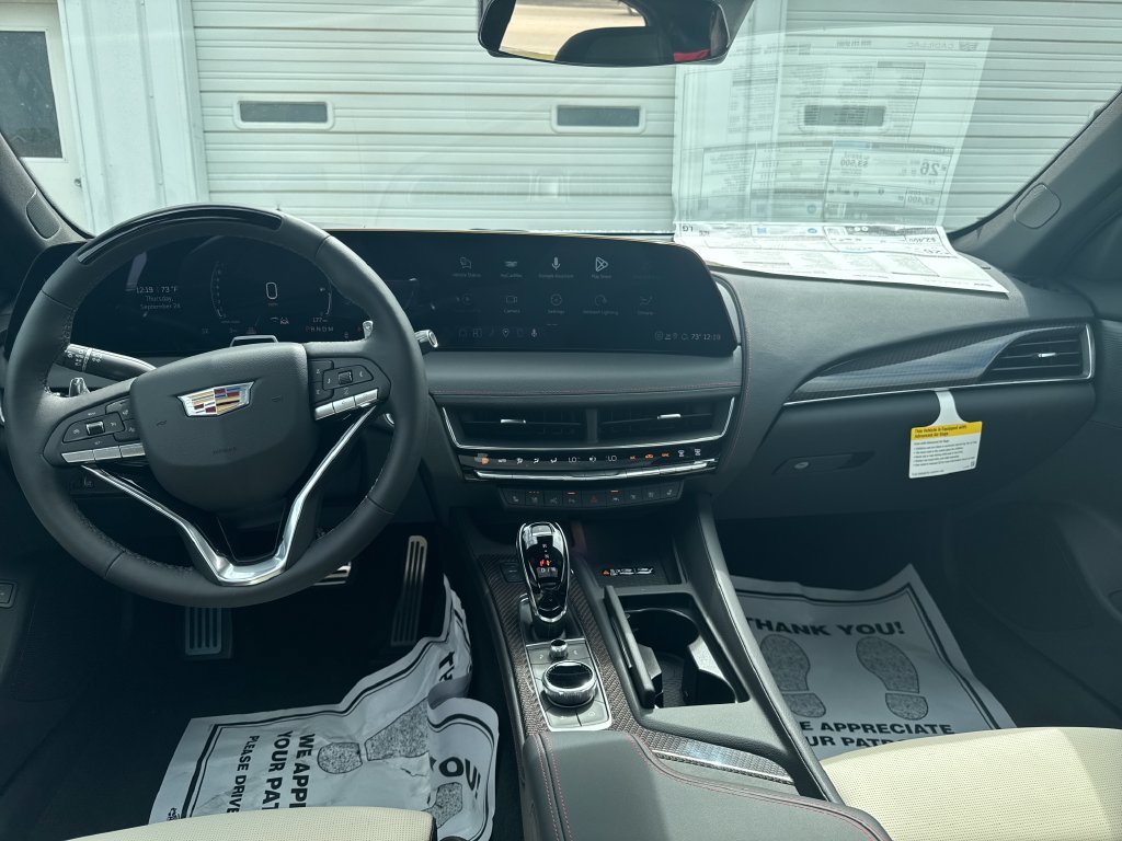 New 2026 Vibrant White Tricoat Cadillac Sport image 17
