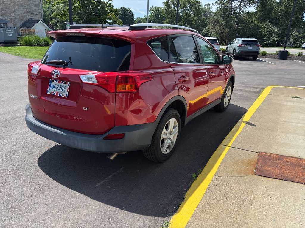 Used 2015 Barcelona Red Metallic Toyota LE image 4