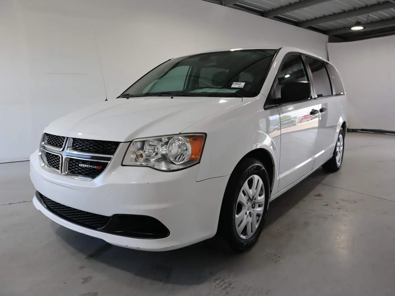Used 2019 White Knuckle Clear Coat Dodge SE image 1
