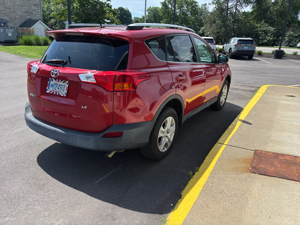 Used 2015 Barcelona Red Metallic Toyota LE image 4