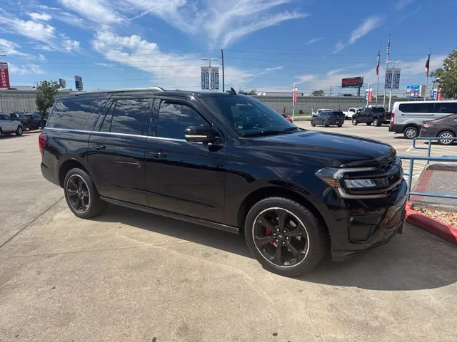 Used 2024 Black Metallic Ford Limited image 1