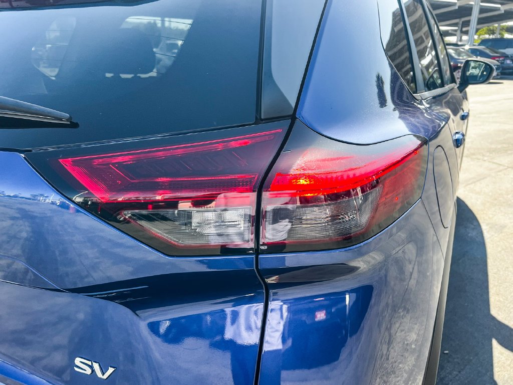 Used 2022 Caspian Blue Metallic Nissan SV image 8