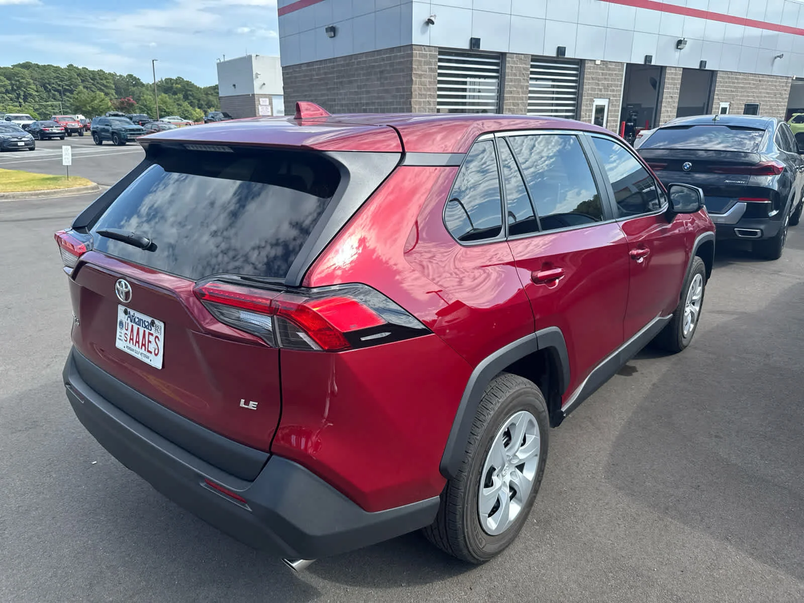 Certified Used 2025 Ruby Flare Pearl Toyota LE image 4