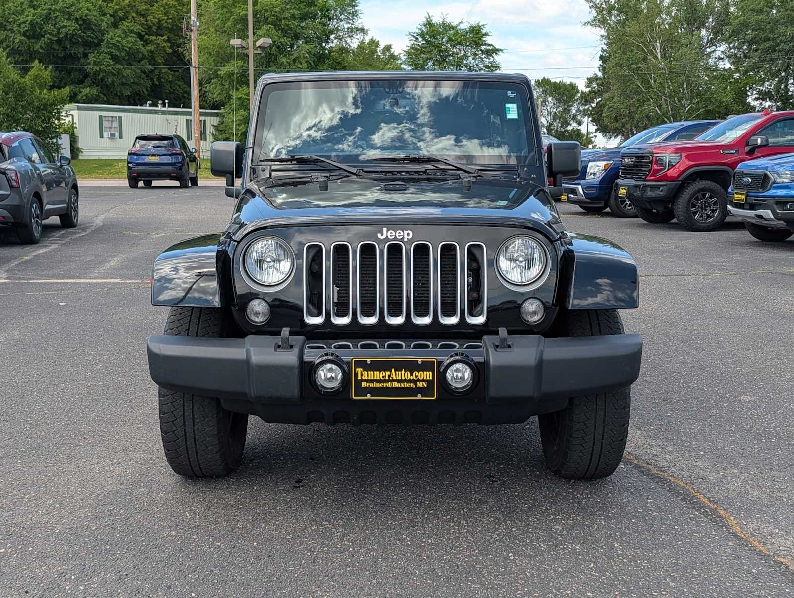 Used 2016 Jeep Wrangler Unlimited Sahara with VIN 1C4BJWEG0GL132036 for sale in Brainerd, Minnesota