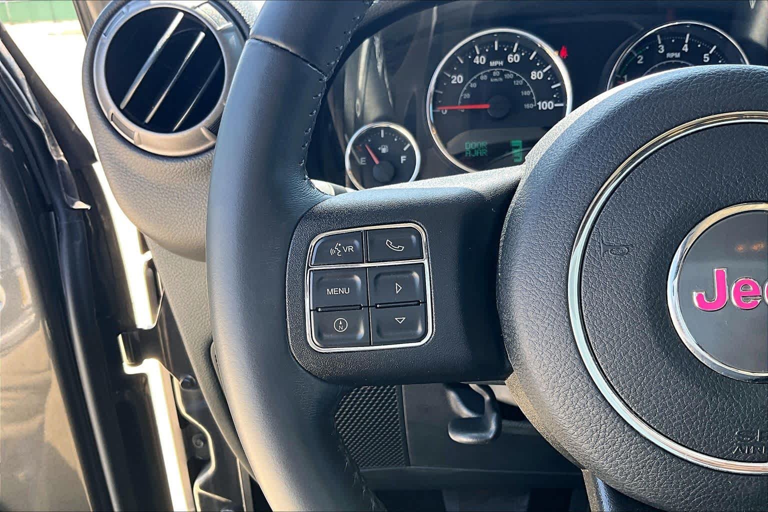 Used 2018 Granite Crystal Metallic Clearcoat Jeep Sport S image 21