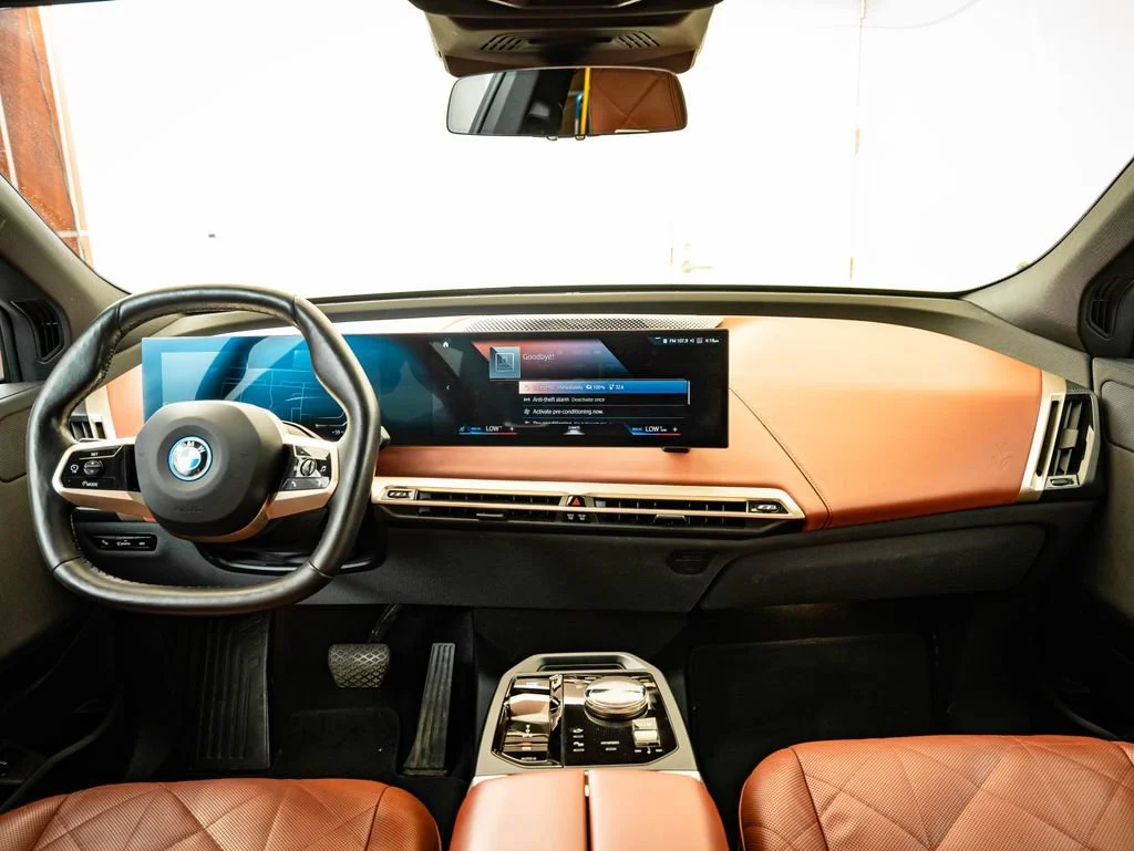 Used 2023 Black Sapphire Metallic BMW xDrive50 image 4