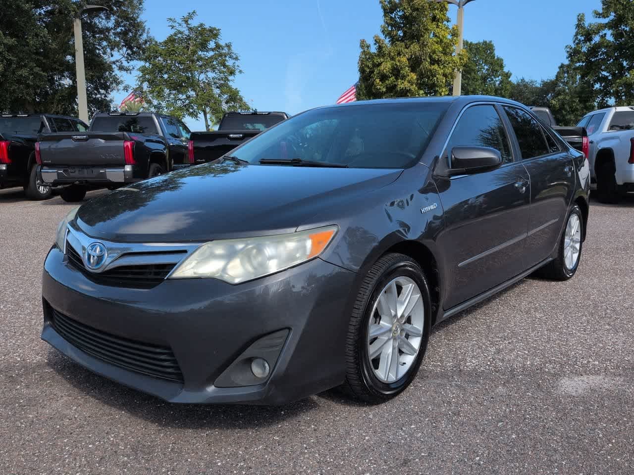 Used 2014 Toyota Camry LE Hybrid with VIN 4T1BD1FK7EU109899 for sale in Wesley Chapel, FL