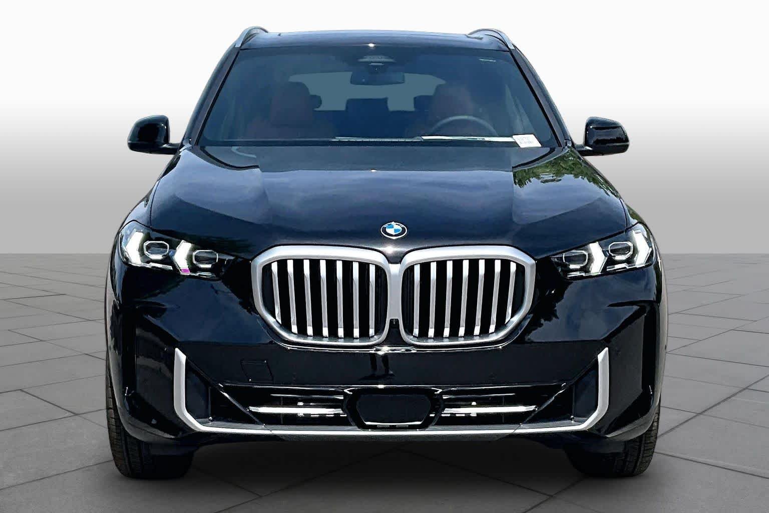 New 2026 Black Sapphire Metallic BMW sDrive40i image 3