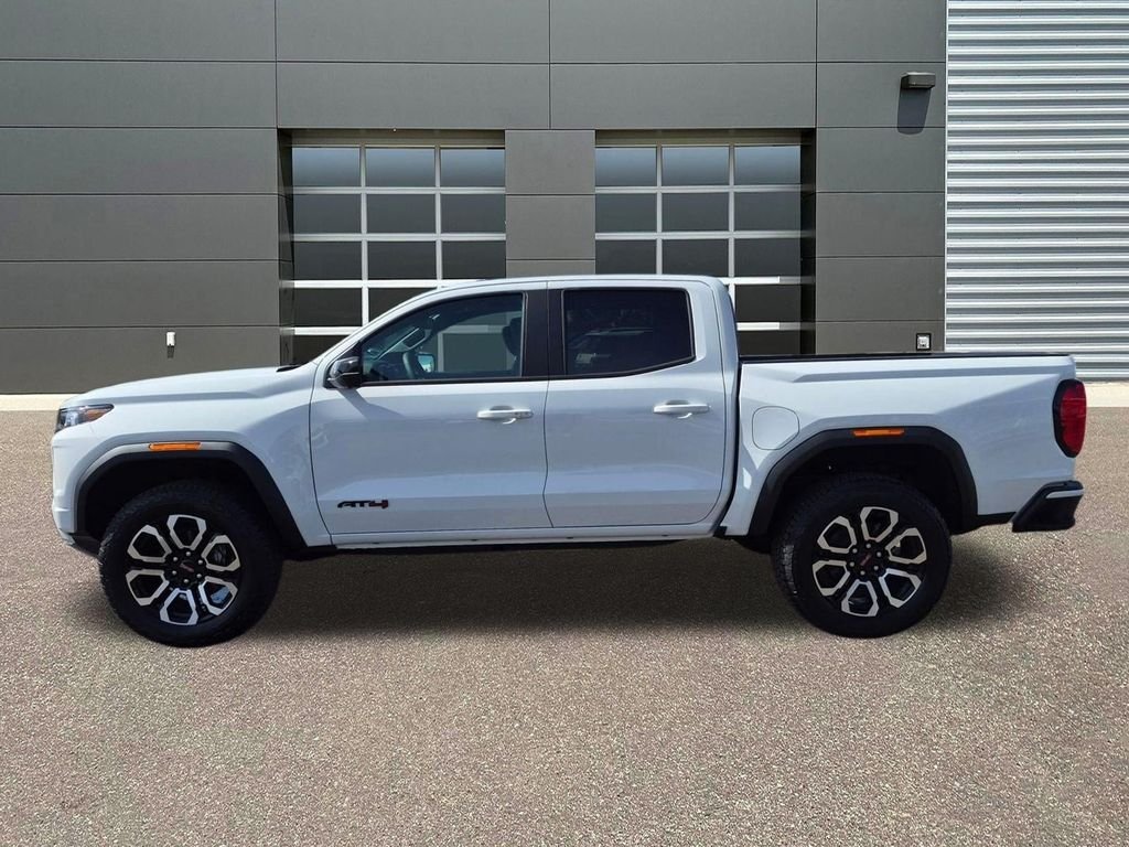 New 2026 Summit White GMC 4WD AT4 image 9