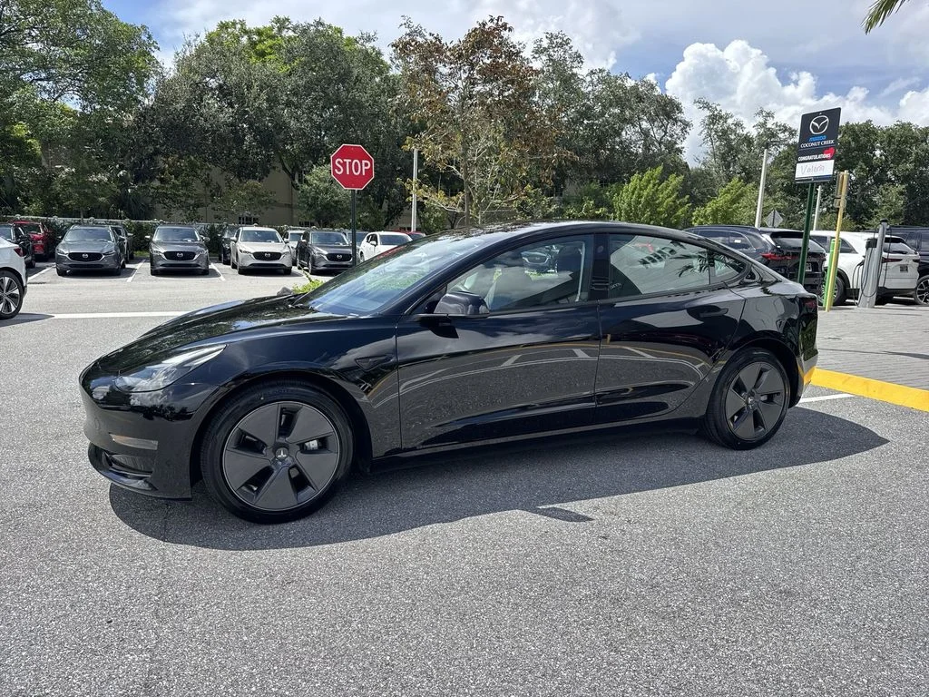 Used 2023 Solid Black Tesla  image 10