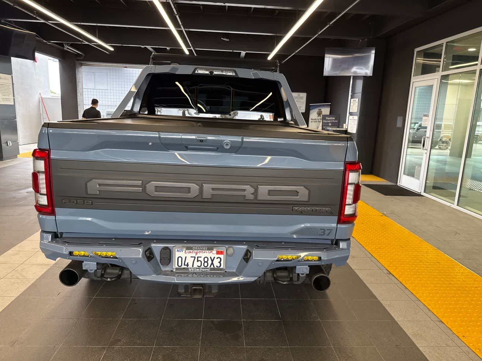Used 2023 Azure Gray Metallic Tri-Coat Ford Raptor image 16