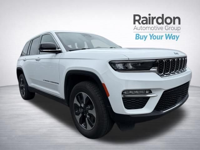 Used 2024 Bright White Clearcoat Jeep 4xe image 1