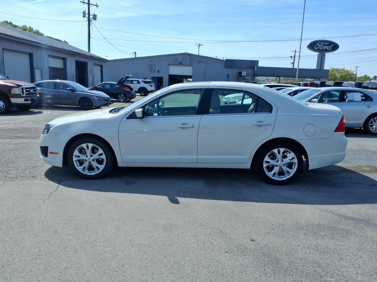 Used 2012 Ford Fusion SE with VIN 3FAHP0HA9CR325302 for sale in Hartselle, AL