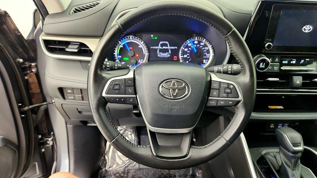 Used 2024 Magnetic Gray Metallic Toyota Hybrid XLE AWD w/ Roof Cross Bars image 14