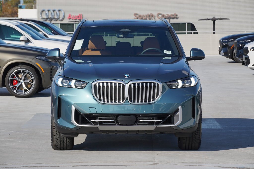 Used 2026 Blue Ridge Mountain Metallic BMW sDrive40i image 2
