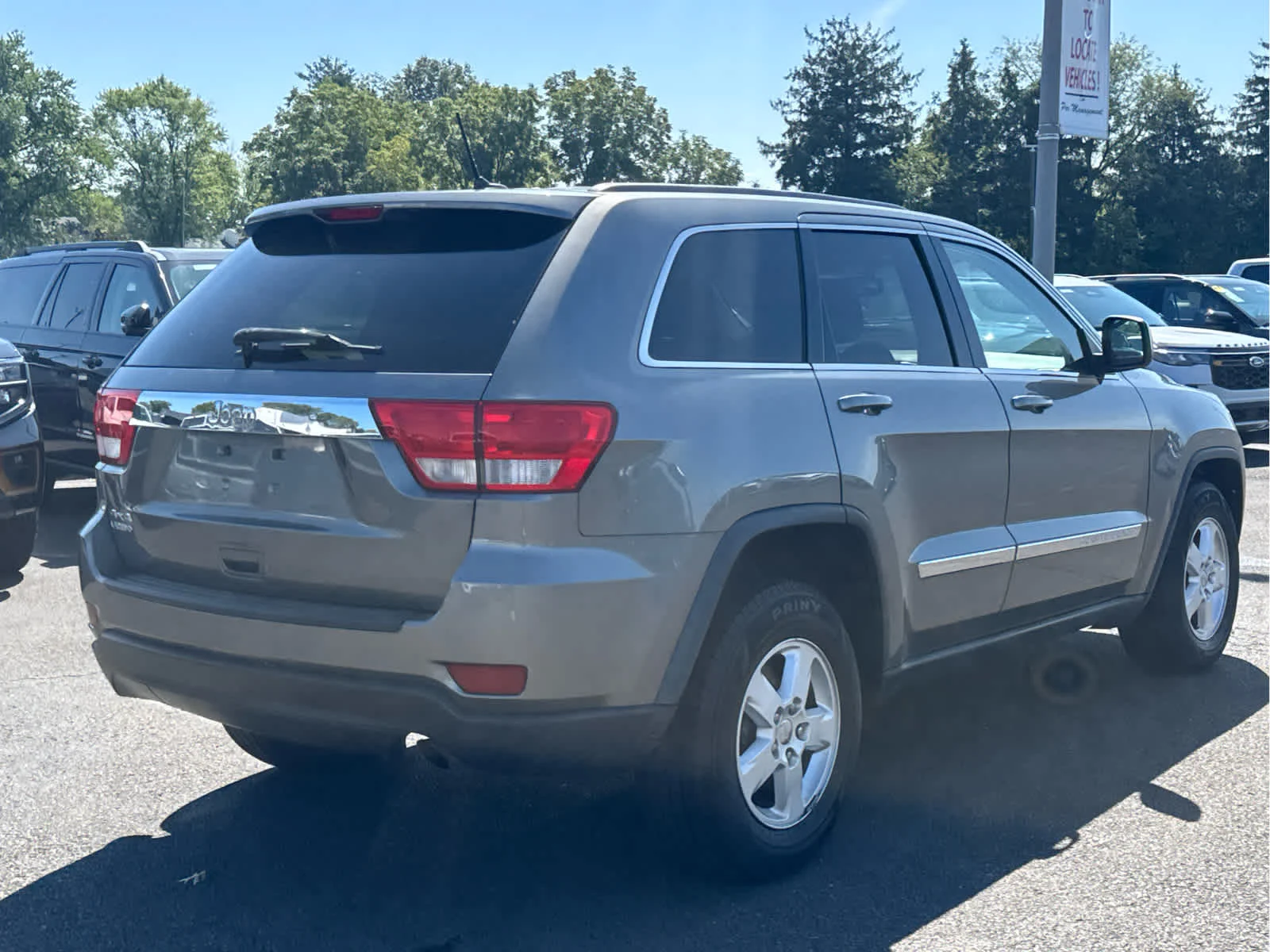 Used 2012 Mineral Gray Metallic Jeep Laredo image 4