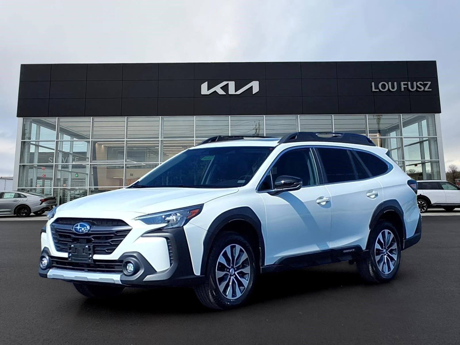 Used 2024 CRYSTAL WHITE PEARL SUBARU UTILITY image 1