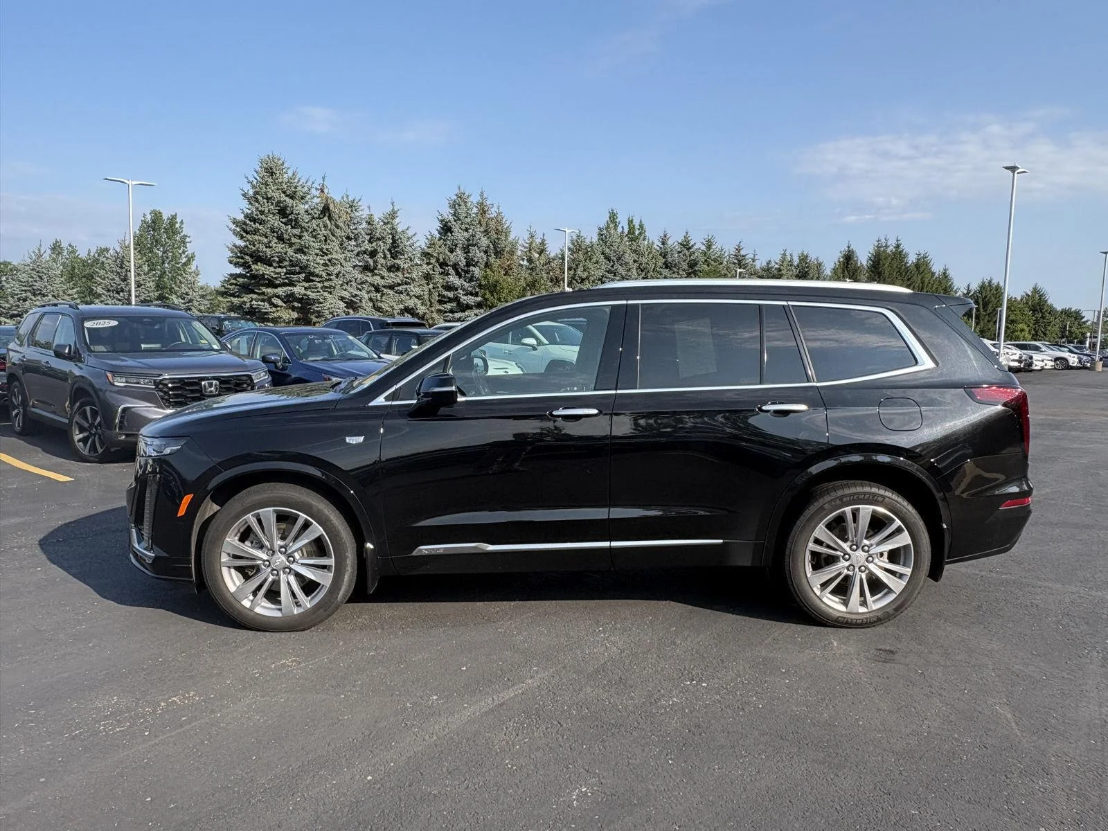 Used 2024 Stellar Black Metallic Cadillac AWD Premium Luxury image 4