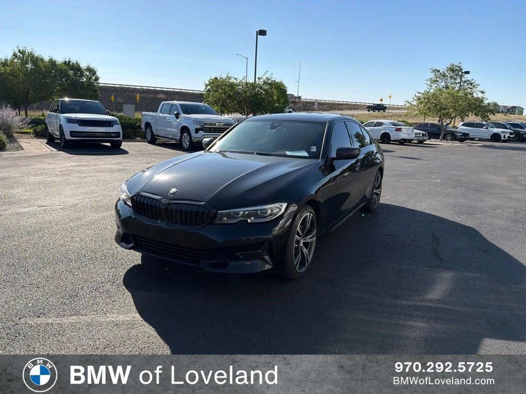 Used 2019 Black Sapphire Metallic BMW 330i xDrive image 1