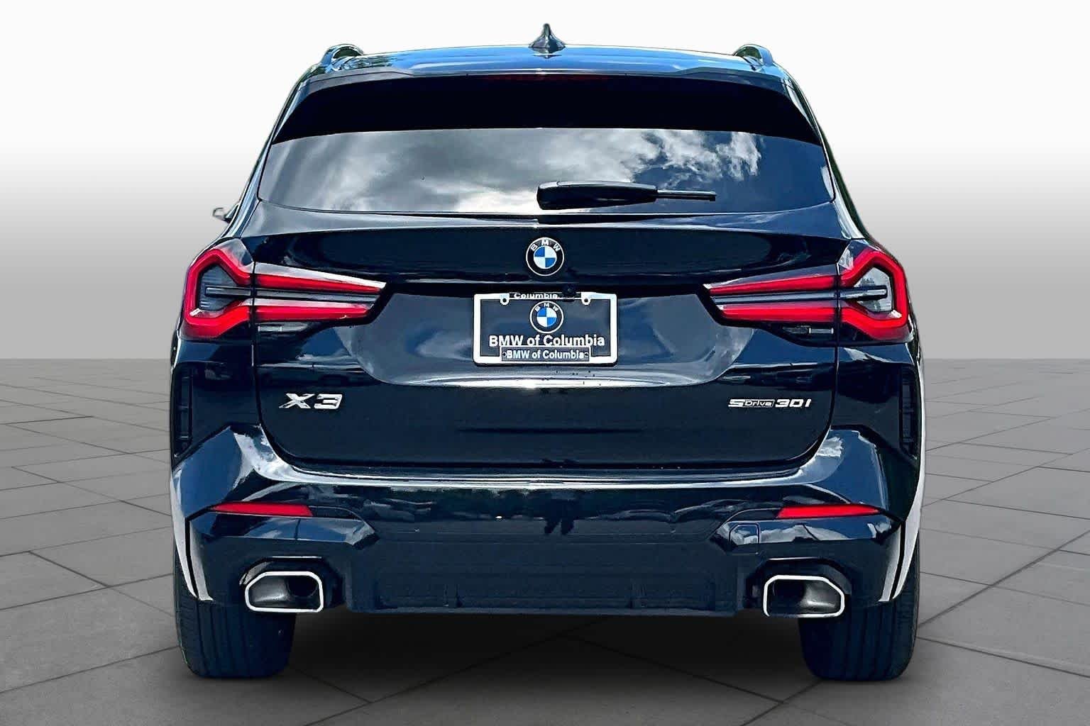 Certified Used 2024 Black Sapphire Metallic BMW sDrive30i image 4