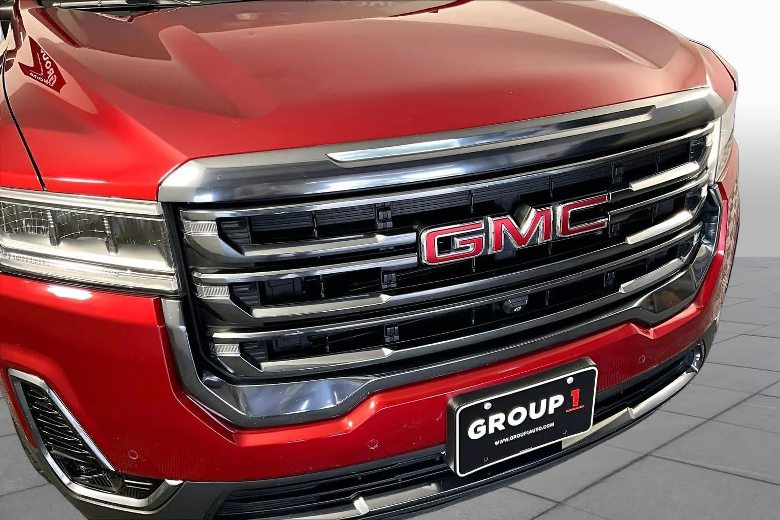Used 2023 VOLCANIC RED TINCOAT GMC AT4 image 57