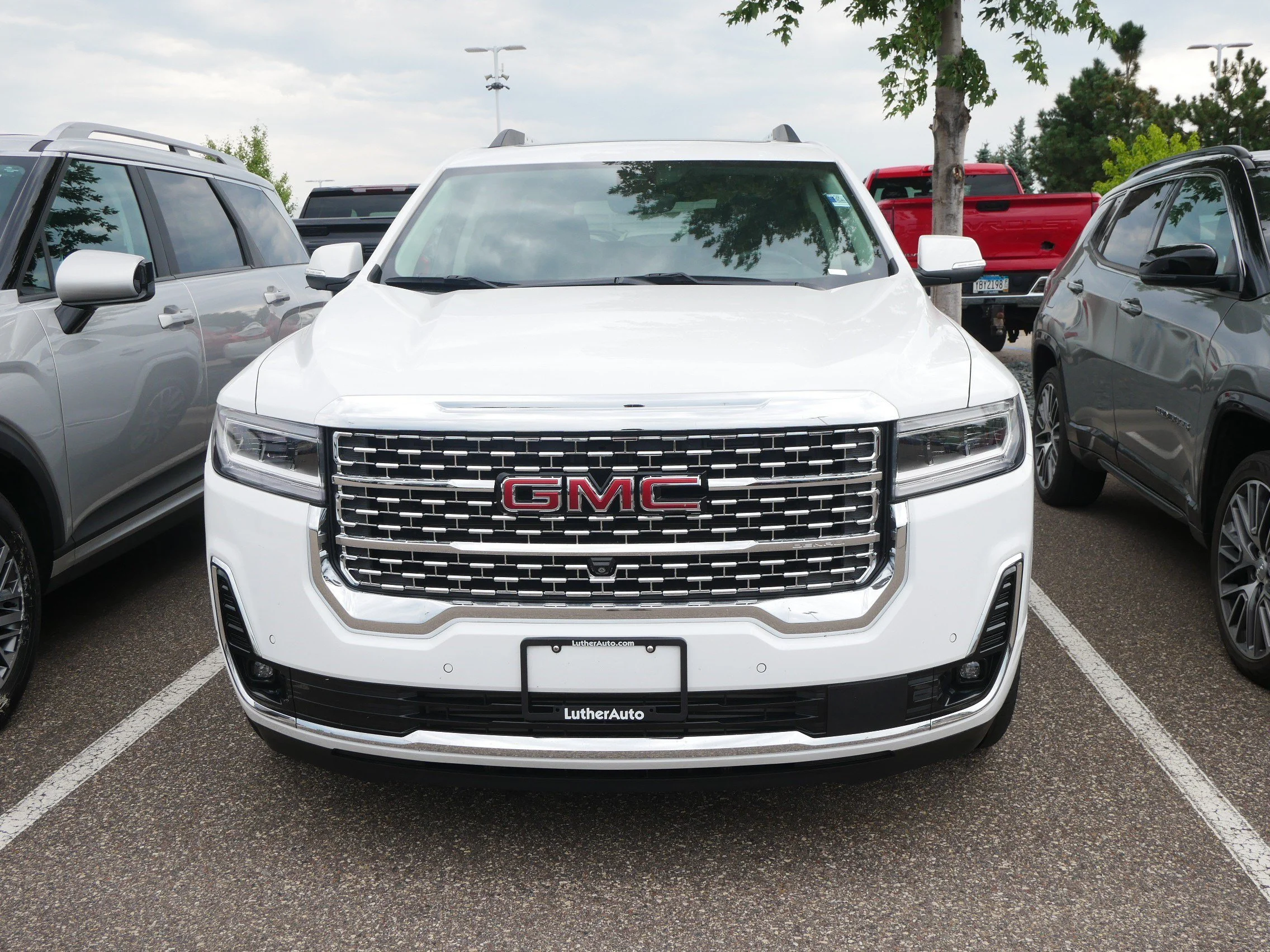 Used 2023 GMC Acadia Denali with VIN 1GKKNXL40PZ204020 for sale in Brooklyn Center, Minnesota