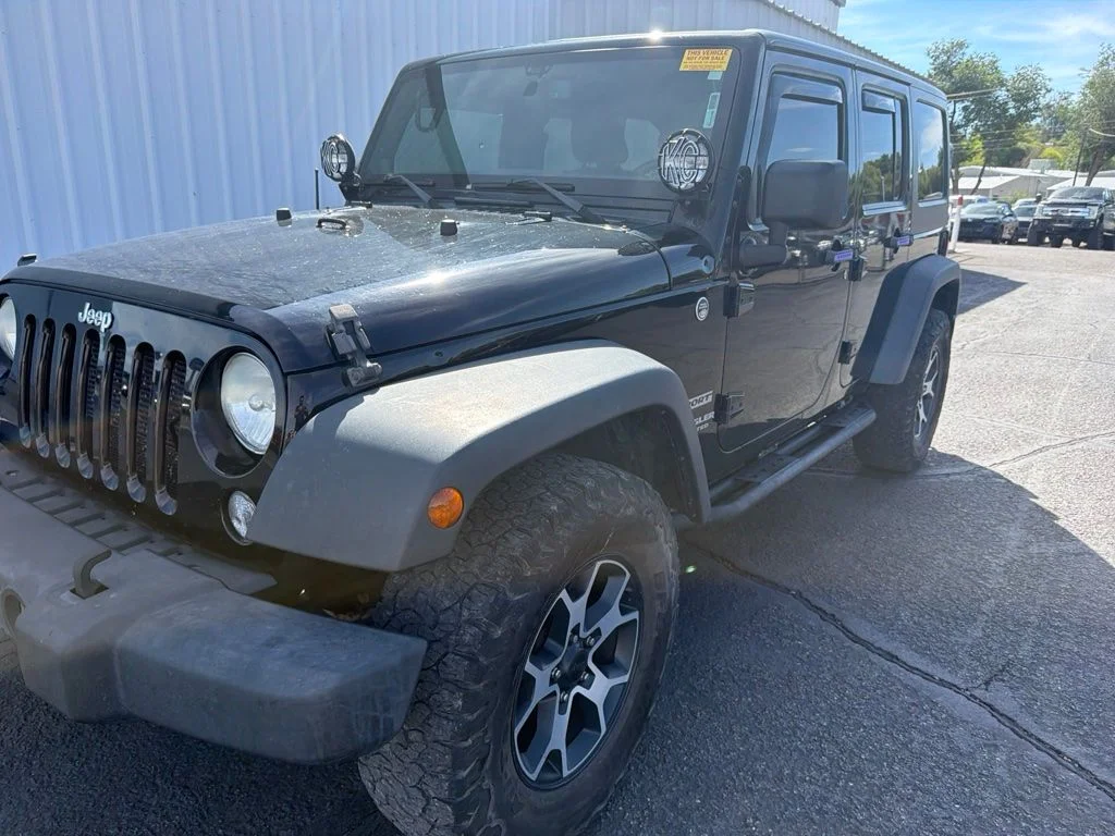 Used 2014 Black Clearcoat Jeep Unlimited Sport image 3