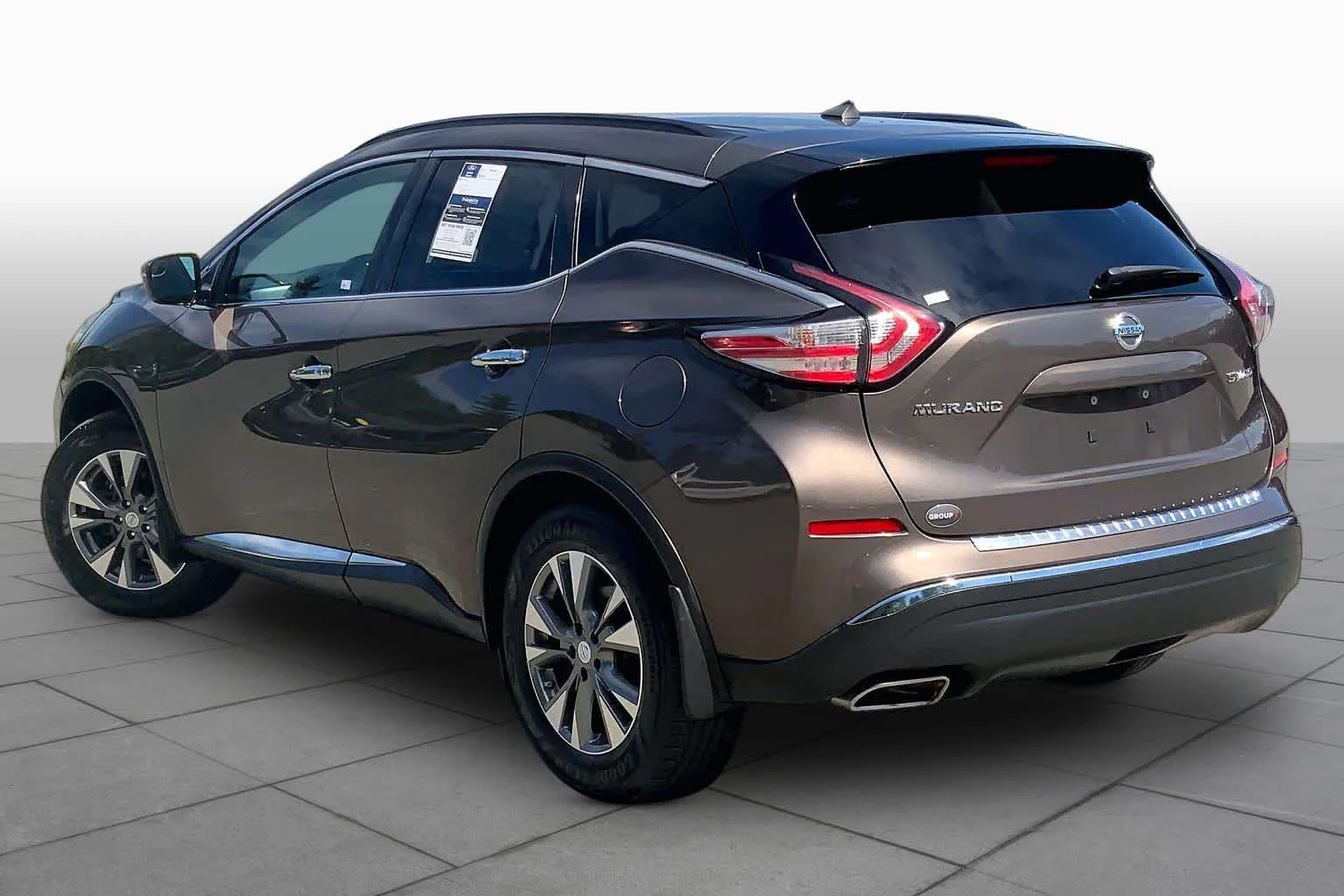 Used 2015 Java Metallic Nissan SV image 12