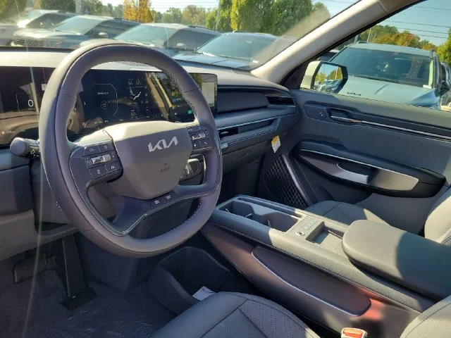 New 2026 Ivory Silver Kia Wind AWD image 13