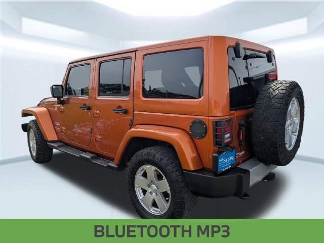 Used 2011 Jeep Wrangler Unlimited Sahara with VIN 1J4BA5H19BL599038 for sale in Milton, FL