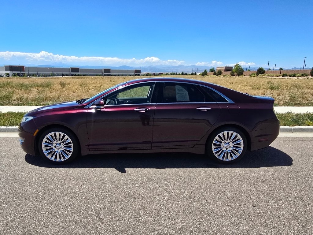 Used 2013 Ruby Red Metallic Tinted Clearcoat Lincoln Base image 2