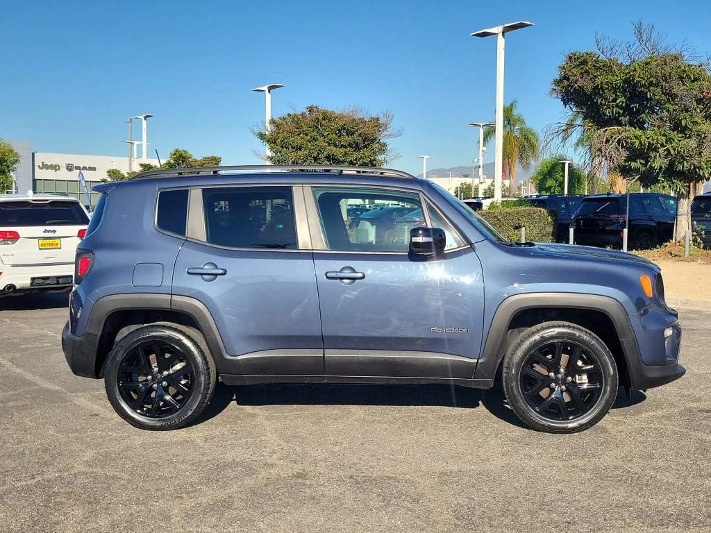 Certified Used 2023 Blue Jeep Altitude image 2