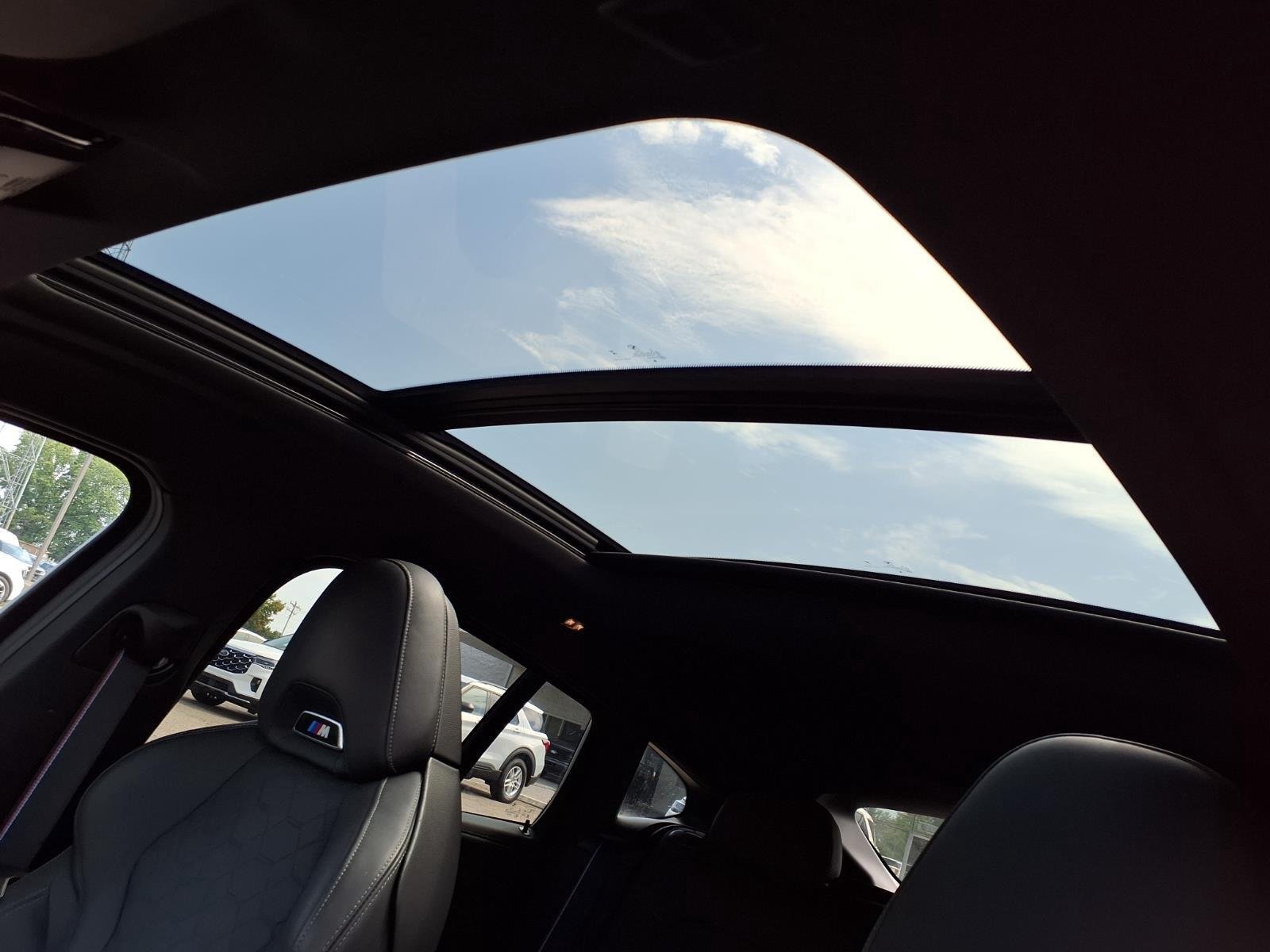 Used 2024 Black Sapphire Metallic BMW  image 9
