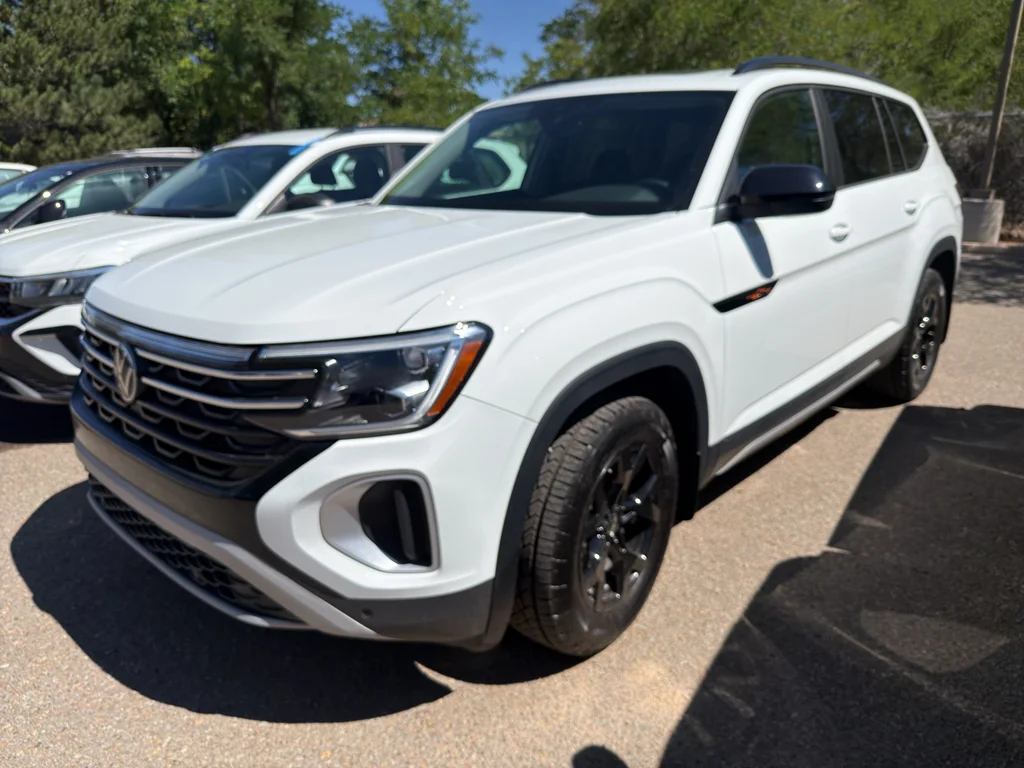 Certified Used 2025 Pure White Volkswagen Peak Edition 4Motion image 1
