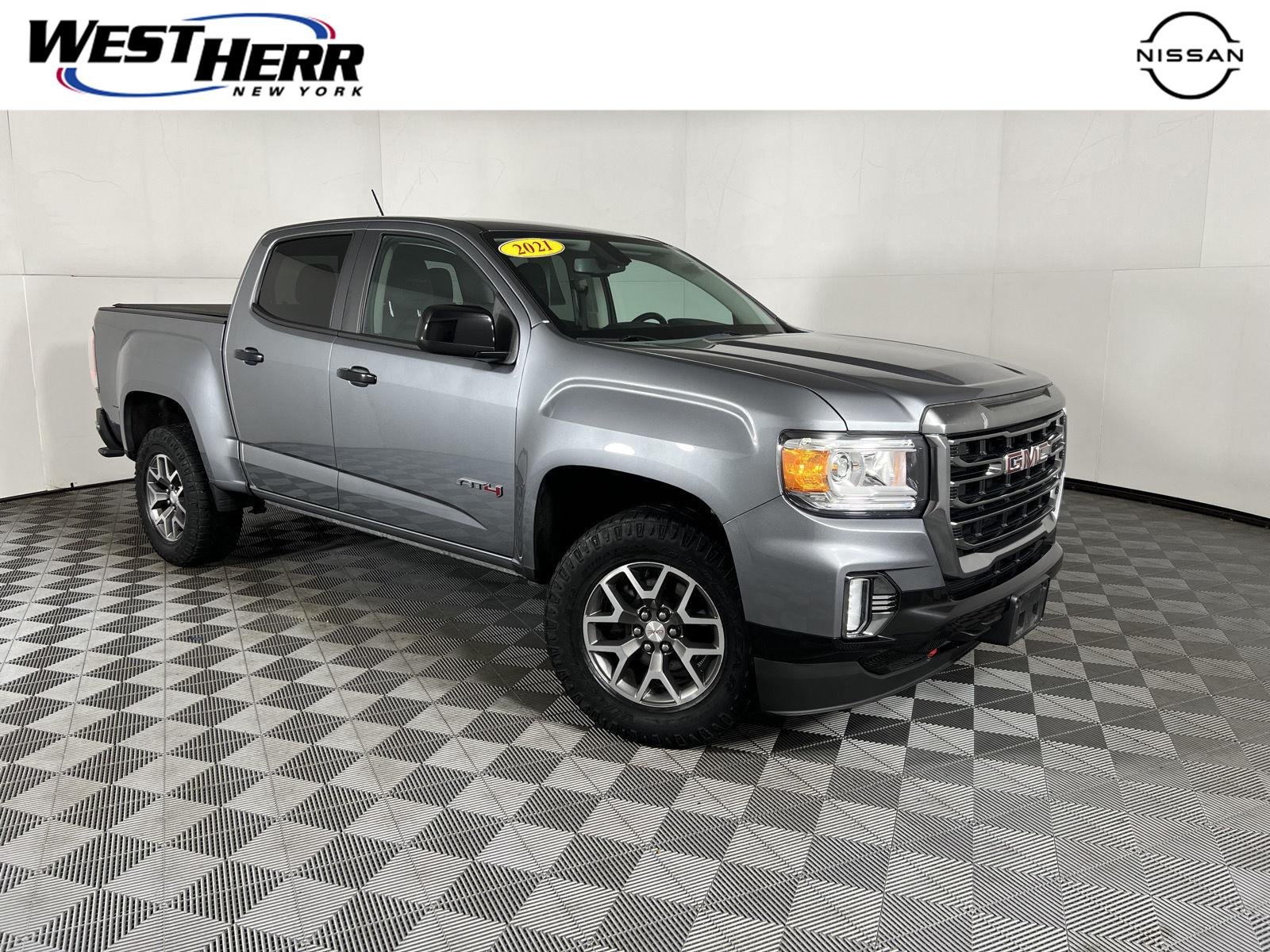 Used 2021 Satin Steel Metallic GMC 4WD AT4 w/Cloth image 1