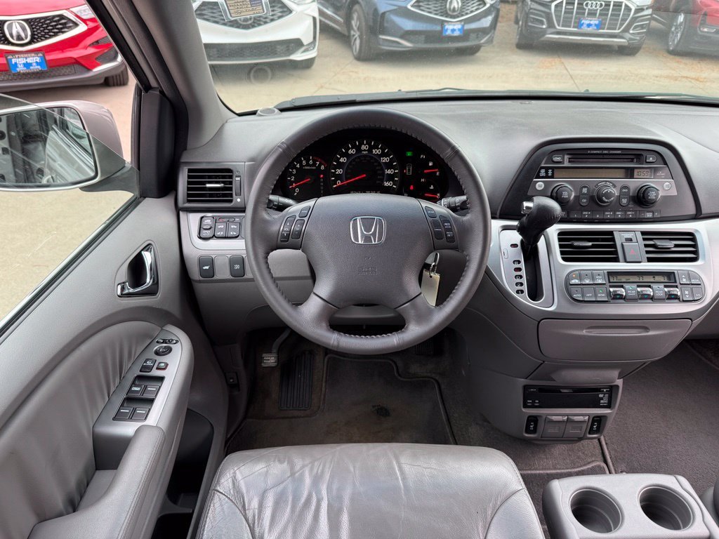Used 2009 Honda Odyssey EX-L with VIN 5FNRL38739B051590 for sale in Boulder, CO