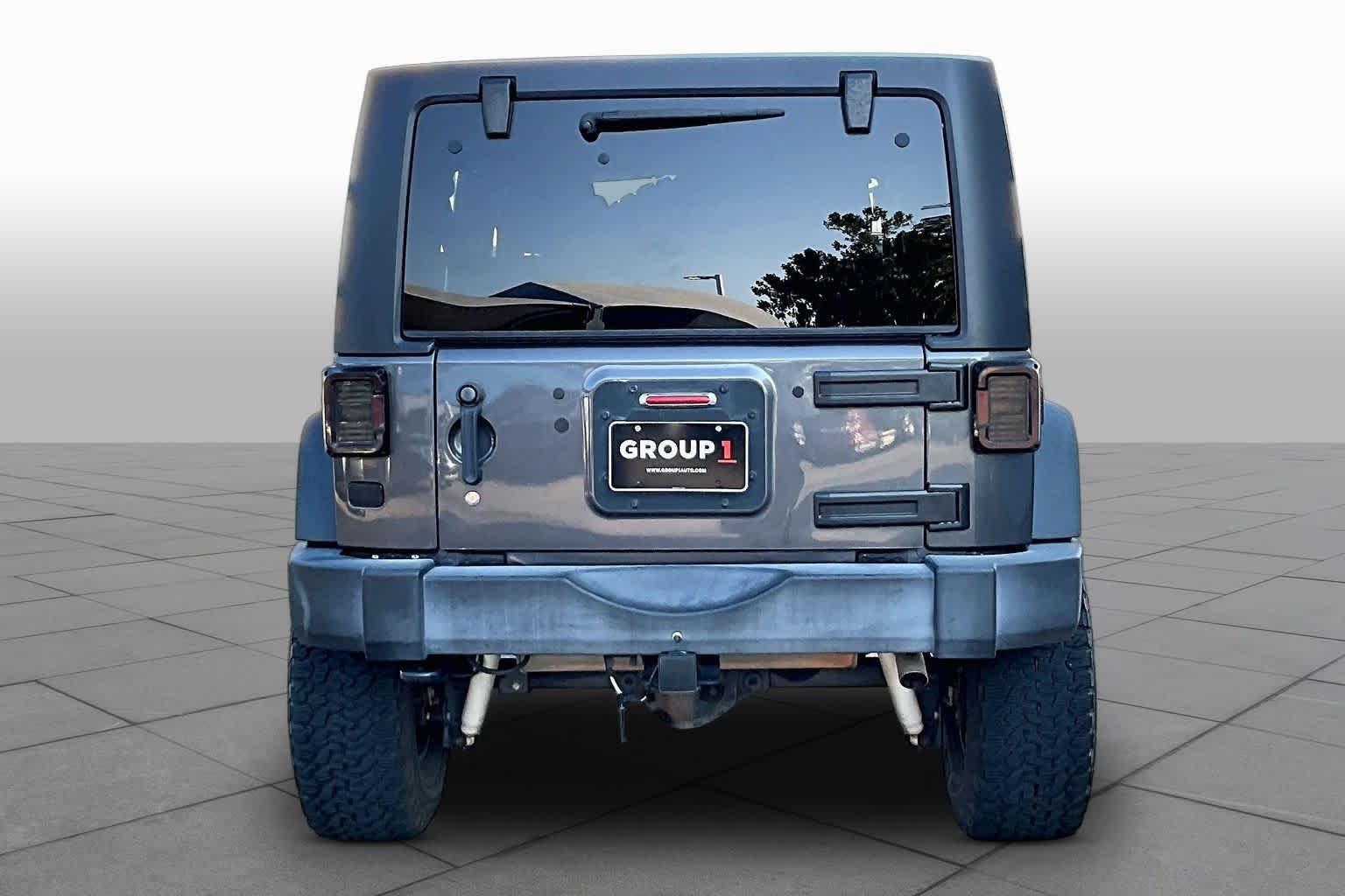 Used 2016 Granite Crystal Metallic Clearcoat Jeep Rubicon image 5