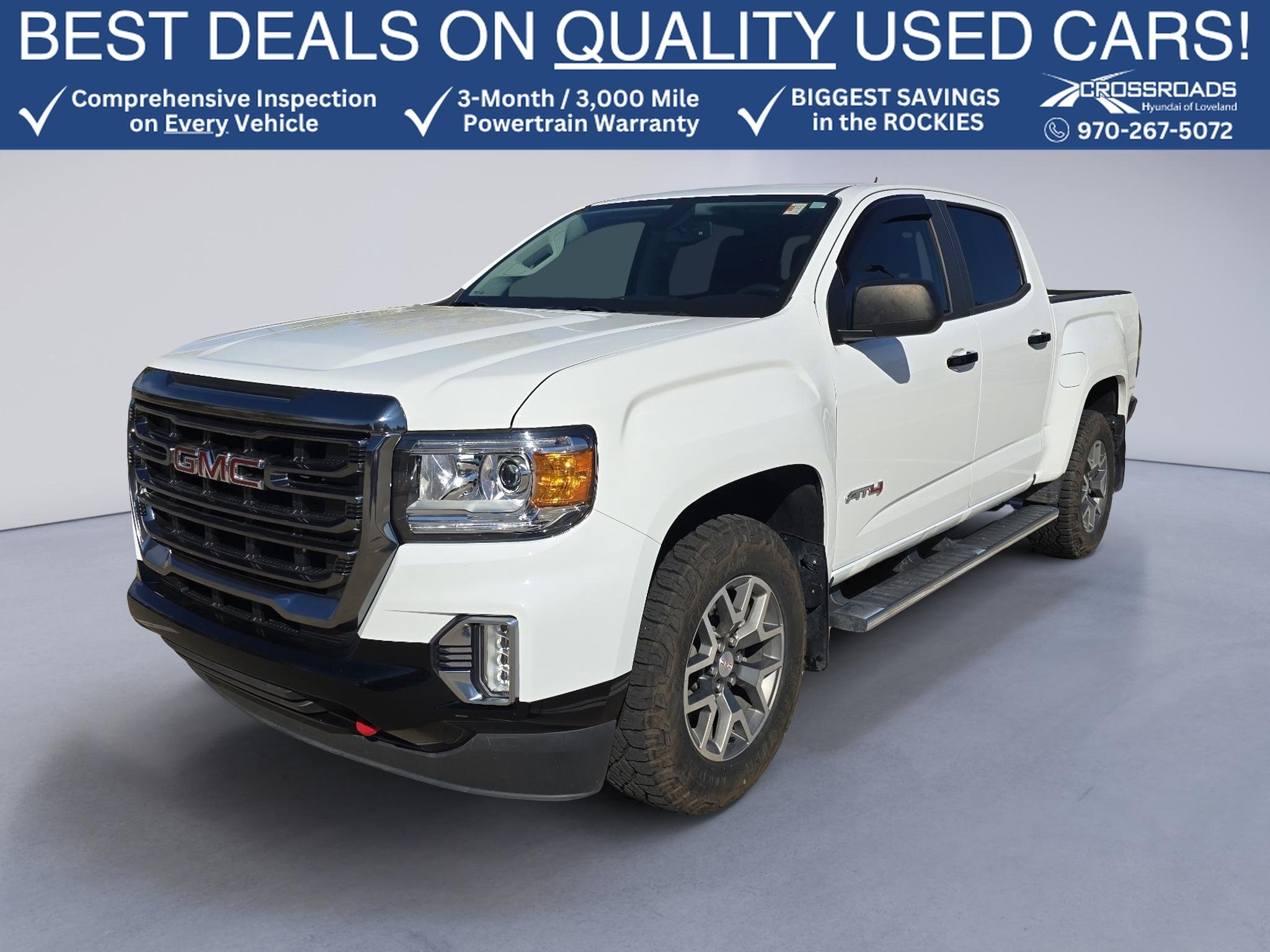 Used 2021 Summit White GMC 4WD AT4 w/Cloth image 1