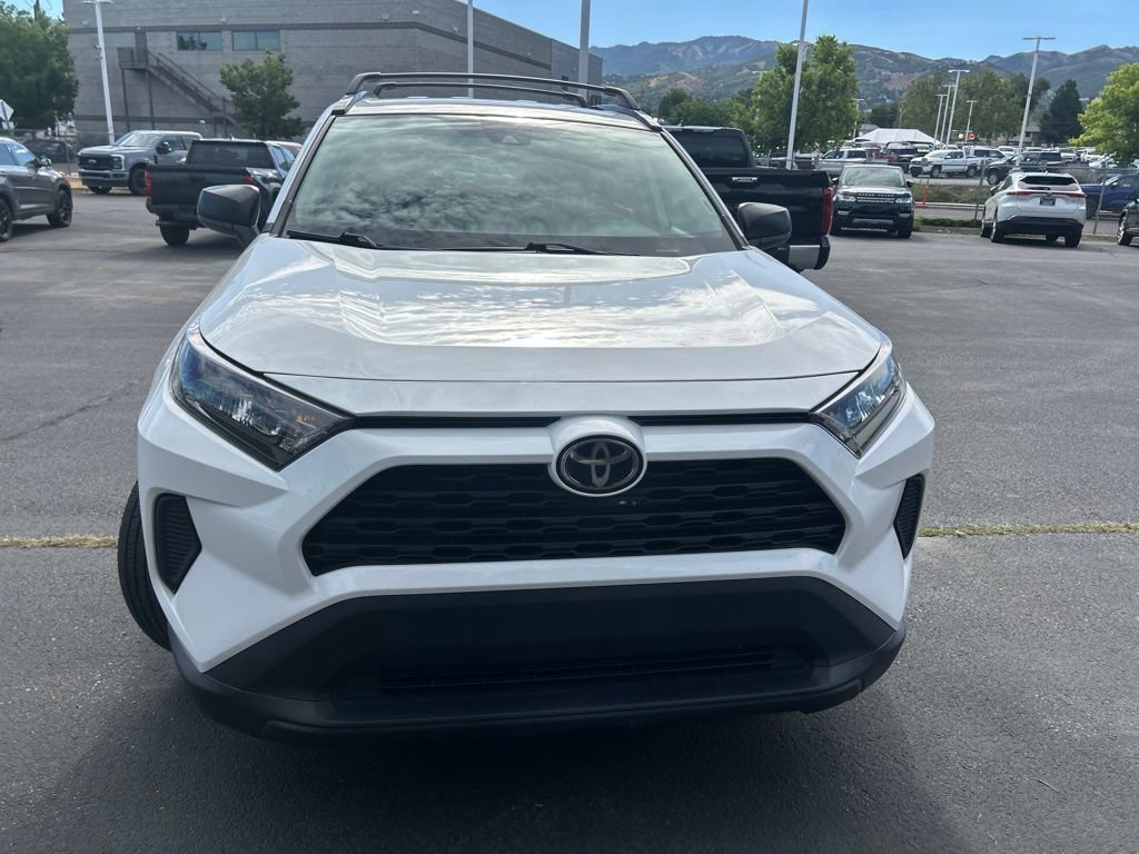 Used 2021 Super White Toyota LE image 3