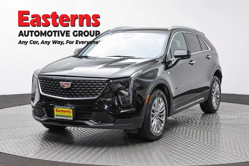 Used 2024 Black Cadillac Premium Luxury image 1