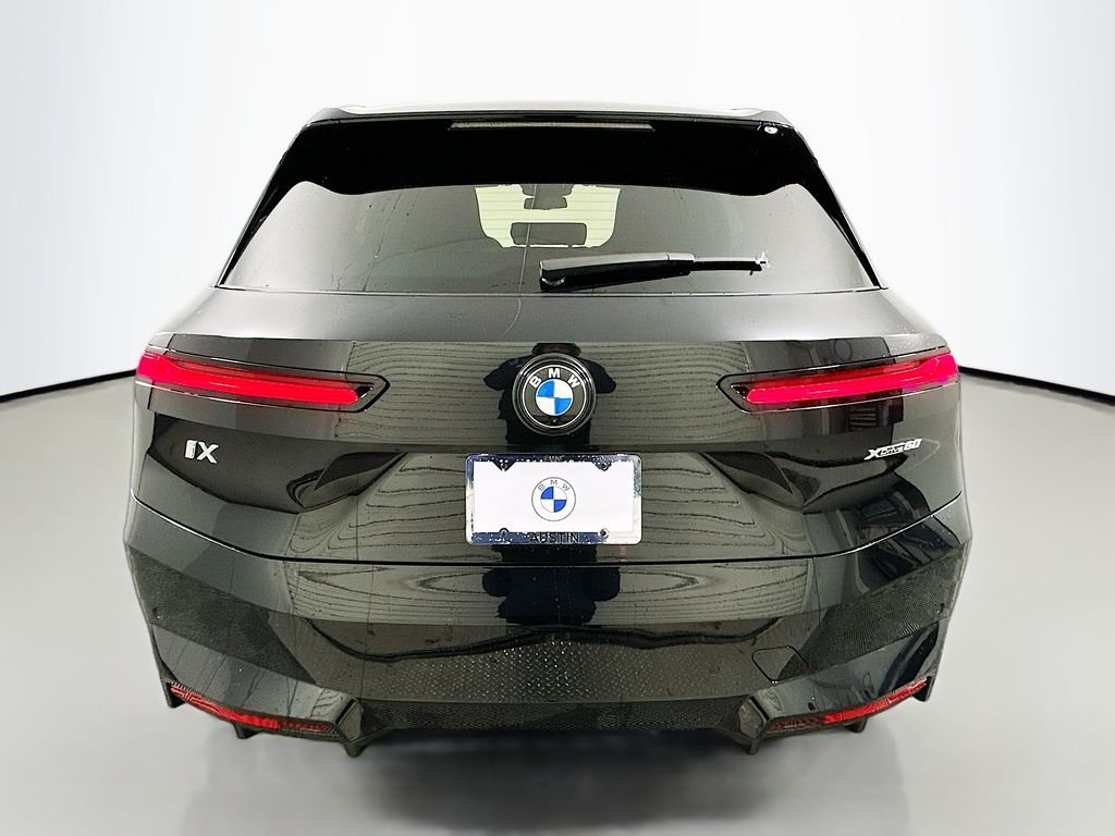 Used 2026 Black Sapphire Metallic BMW xDrive60 image 6