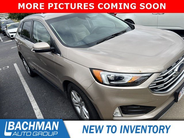 Used 2020 Desert Gold Metallic Ford SEL image 1