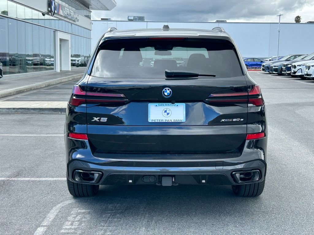 New 2026 Black Sapphire Metallic BMW xDrive50e image 4