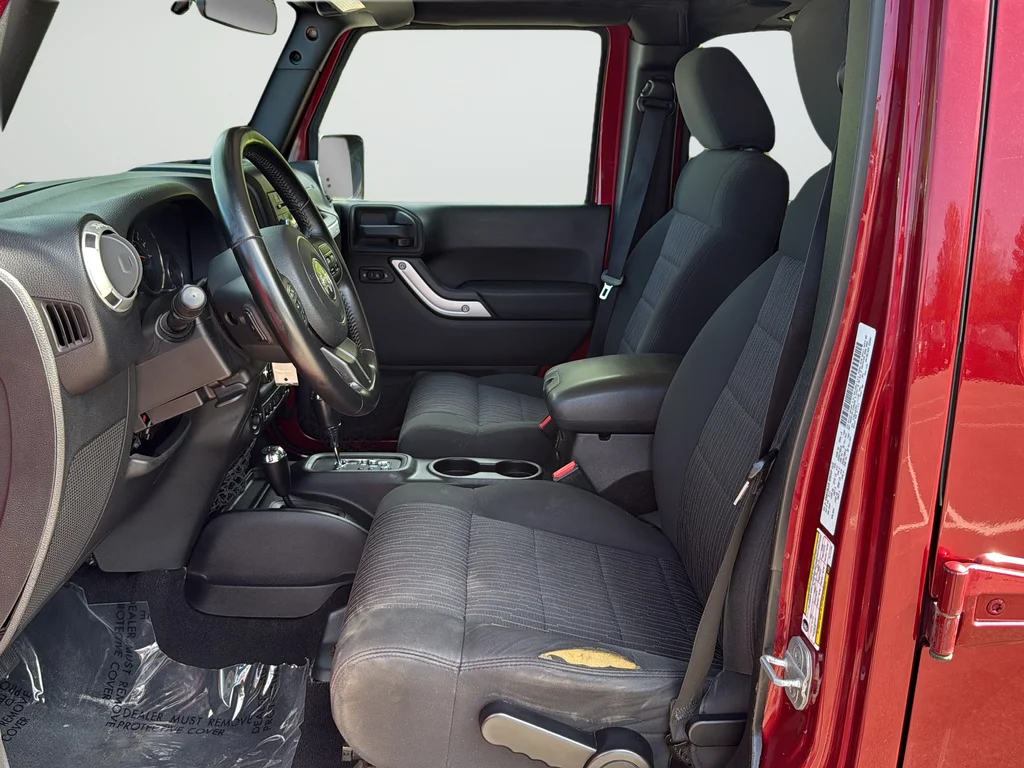 Used 2012 Red Jeep Unlimited Sahara image 10