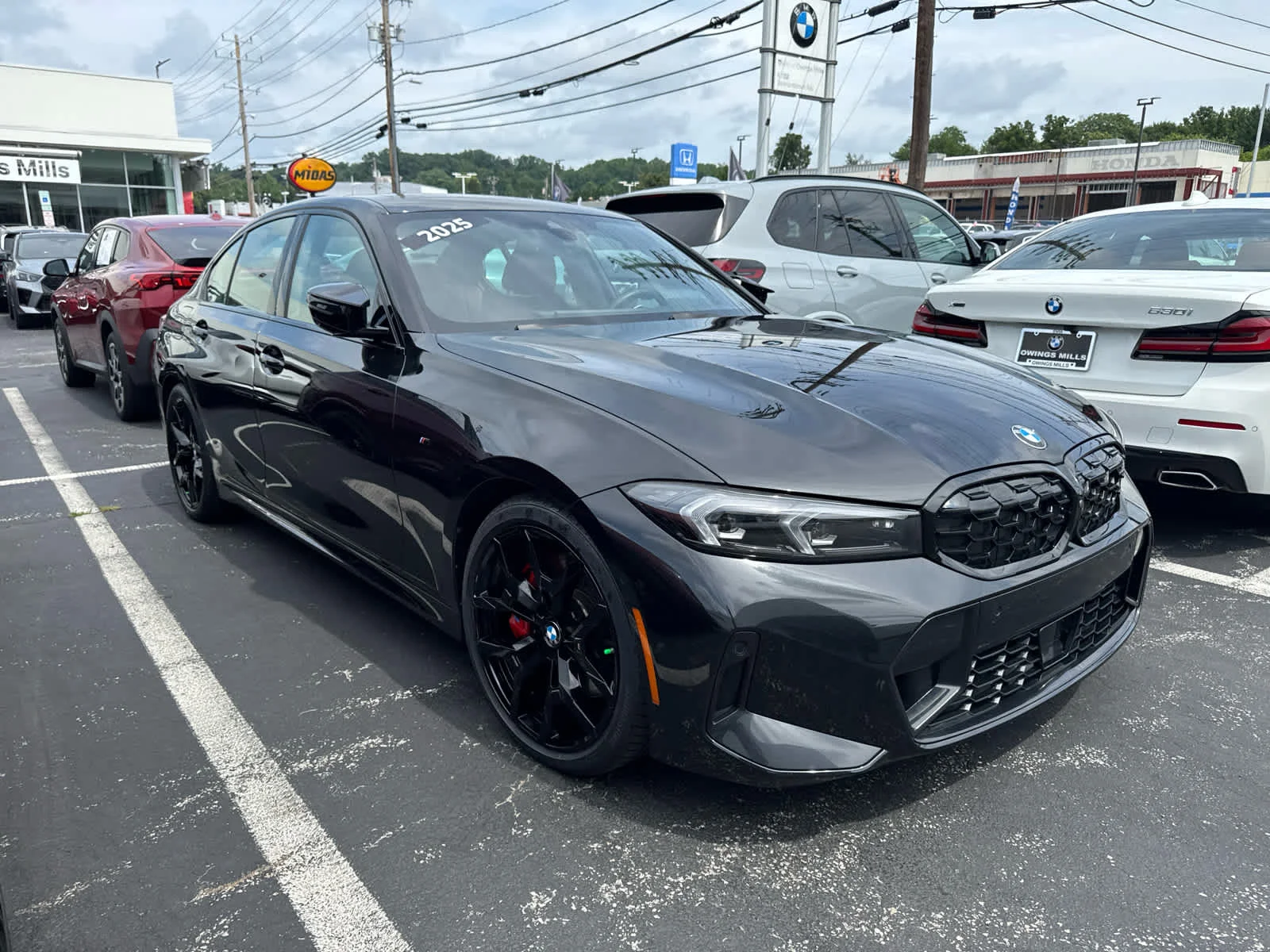 Used 2025 Black Sapphire Metallic BMW M340i xDrive image 2