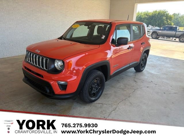 Used 2019 Orange Jeep Sport image 1