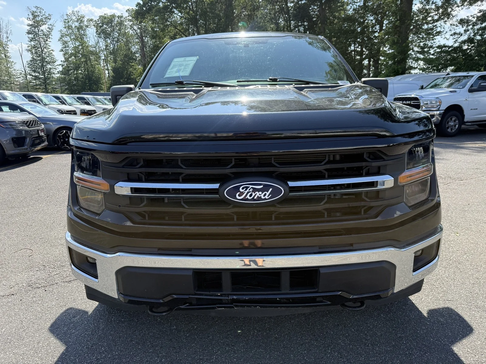Used 2024 Agate Black Metallic Ford XLT 4WD image 2