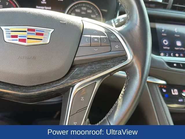 Certified Used 2022 STELLAR BLACK METALLIC Cadillac AWD Premium Luxury image 23