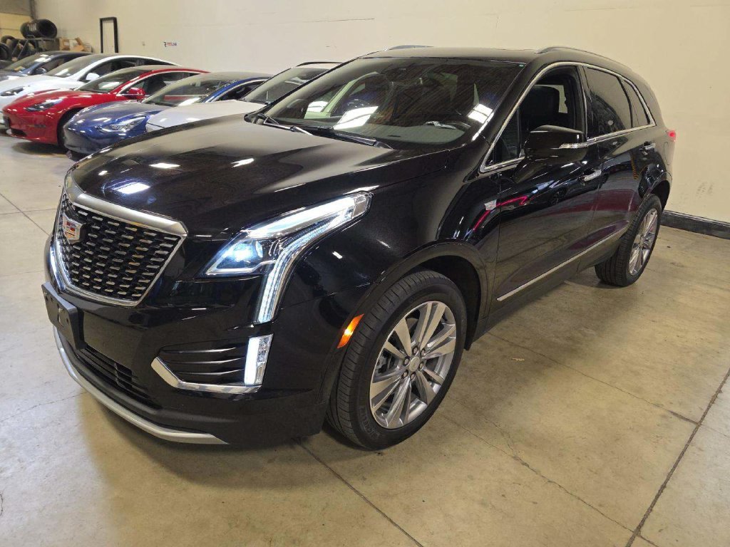 Used 2024 Black Cadillac Premium Luxury image 1