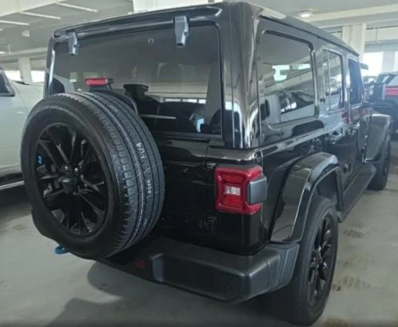 Used 2023 Black Jeep Sahara 4xe image 2